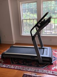 A Nordic Track C2270 folding treadmill,