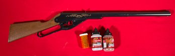 Vintage Daisy BB gun with BBs. 30”L