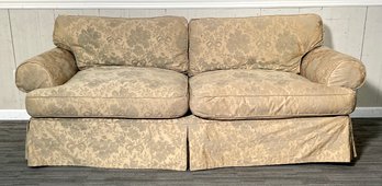 A two cushion sofa, with loose