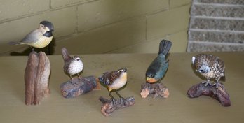 Five vintage carved and paint decorated