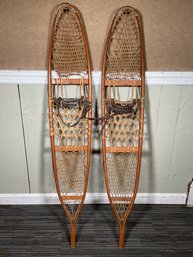 A large pair of vintage ash snowshoes 3c8a27