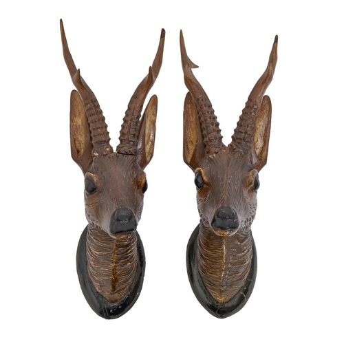 A pair of Black Forest carved wood
