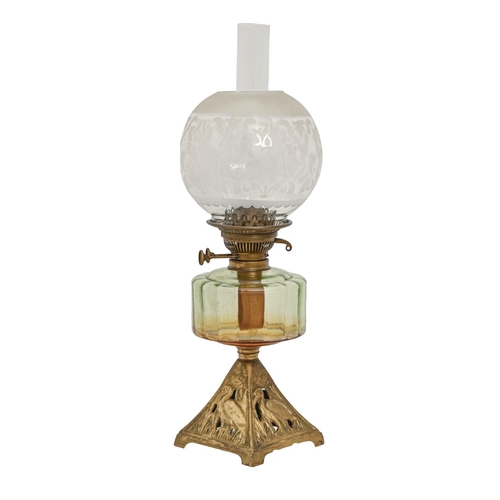 A Victorian oil lamp with gilded 3c8bc2