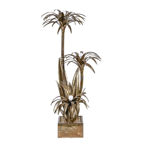 A brass palm tree floor standing