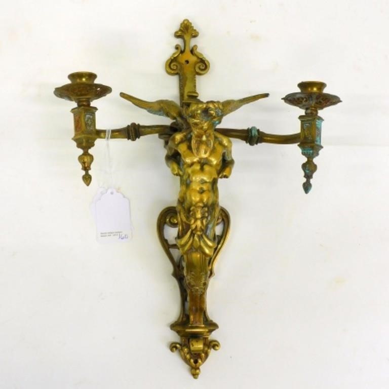 CONTINENTAL BRASS FIGURAL SCONCE.
