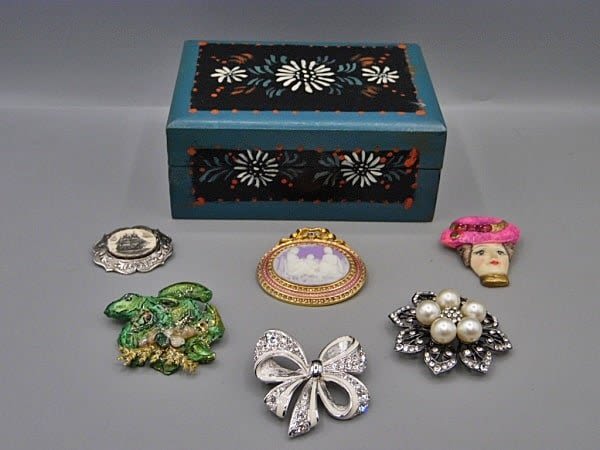 Group of 6 Brooches- Nolan Miller