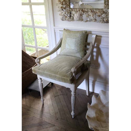 Antique style caned painted armchair