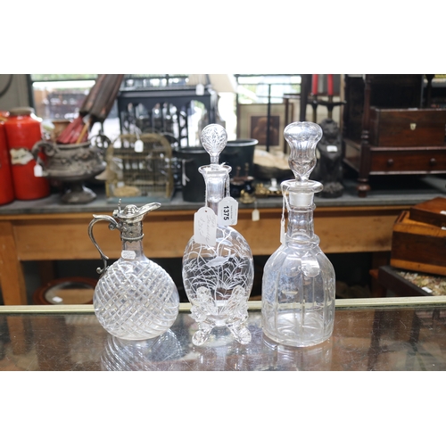 Three decanters, one wheel cut & etched