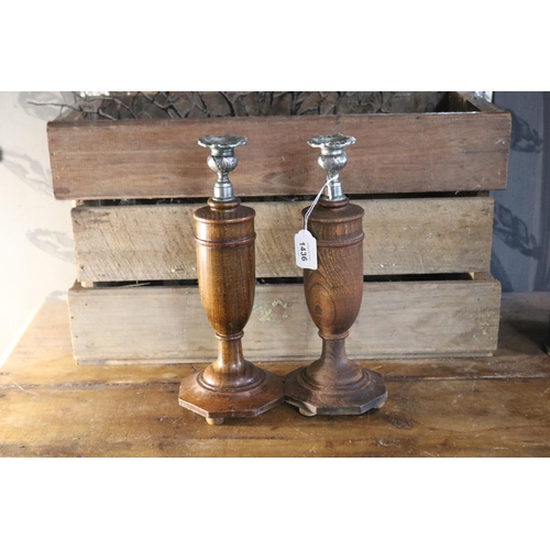 Pair of English oak baluster candlesticks,