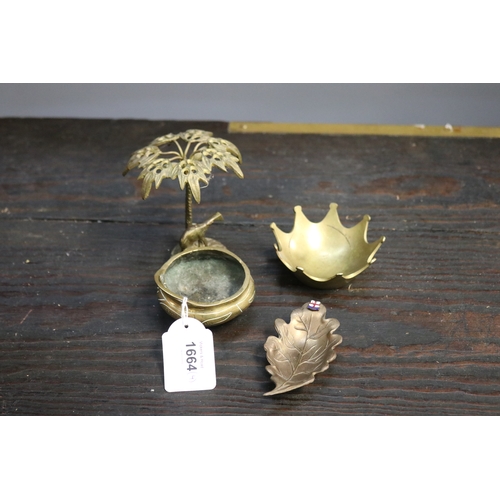 Brass censor, leaf plate and small palm