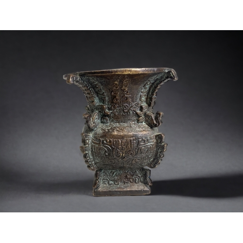 A CHINESE BRONZE VASE. ARCHAISTIC