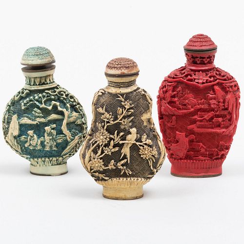 THREE CHINESE CARVED AND STAINED