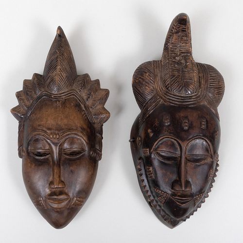 TWO AFRICAN CARVED WOOD MASKS12