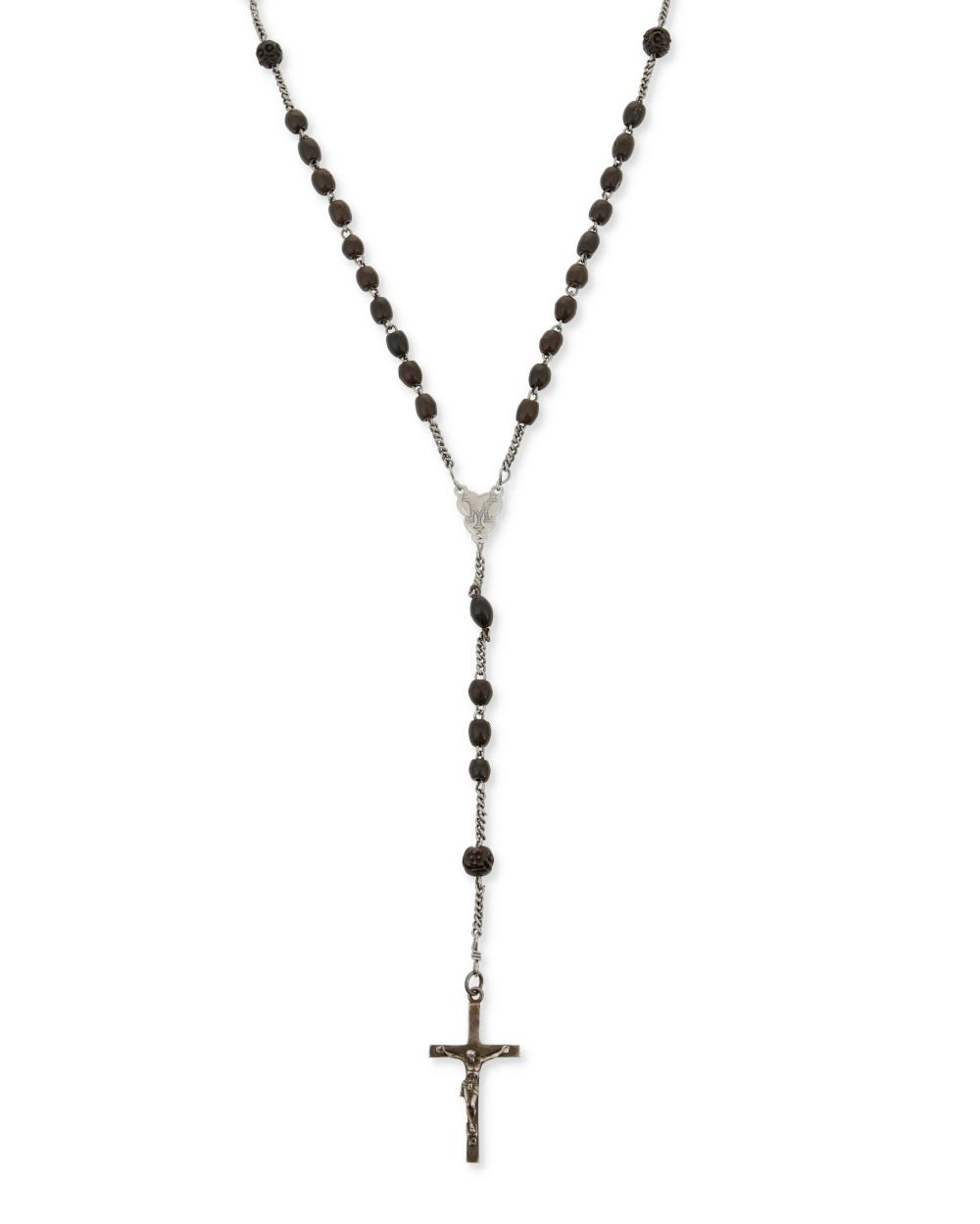 A BLACK BEAD ROSARY BELONGING TO 3c7403