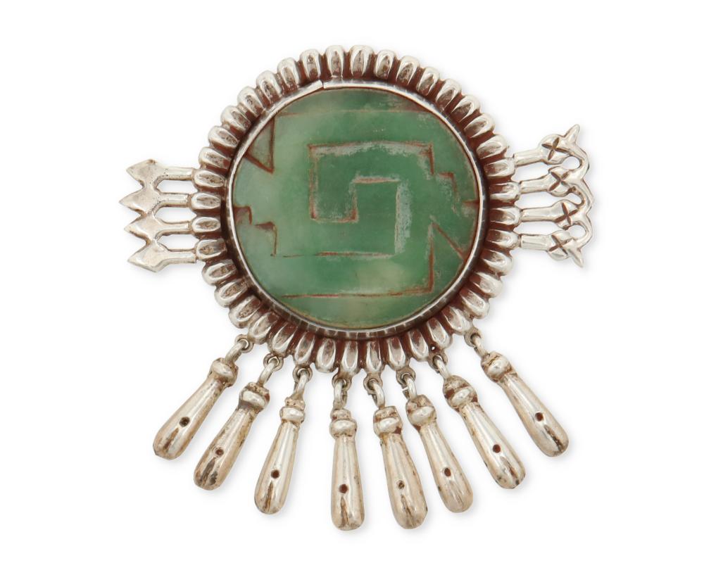 A MEXICAN SILVER BROOCH WITH GREENSTONEA