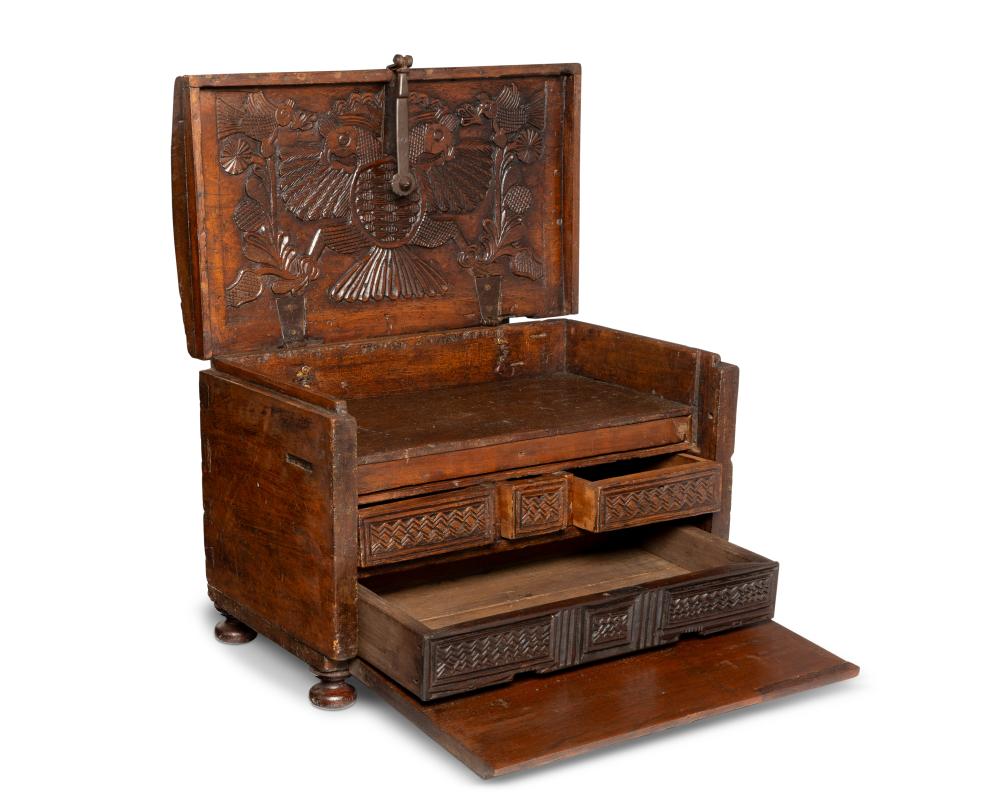 A MEXICAN CARVED WOOD CHEST OF