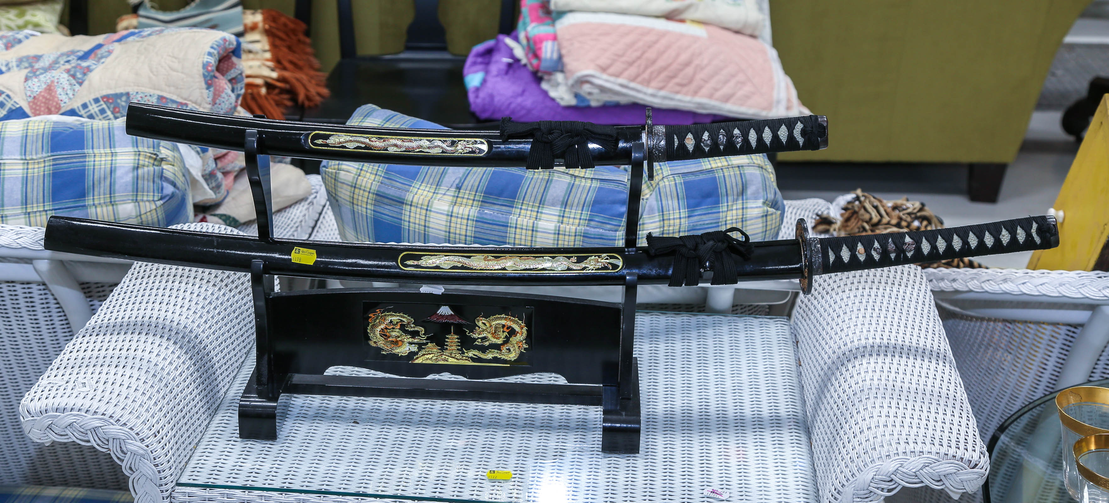 TWO DECORATIVE SAMURAI SWORDS & STAND