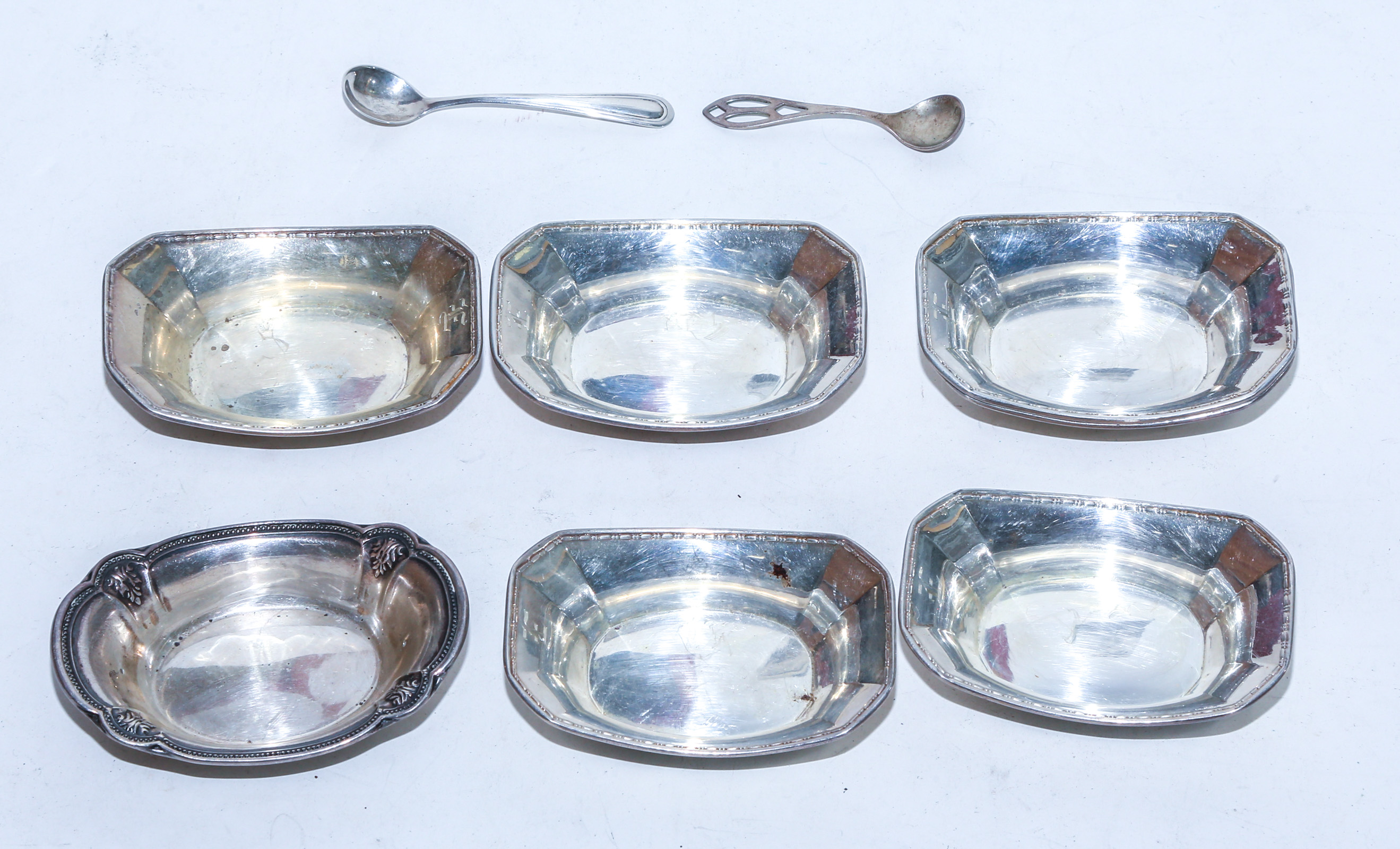 SEVEN STERLING SALTS & TWO SPOONS Comprising