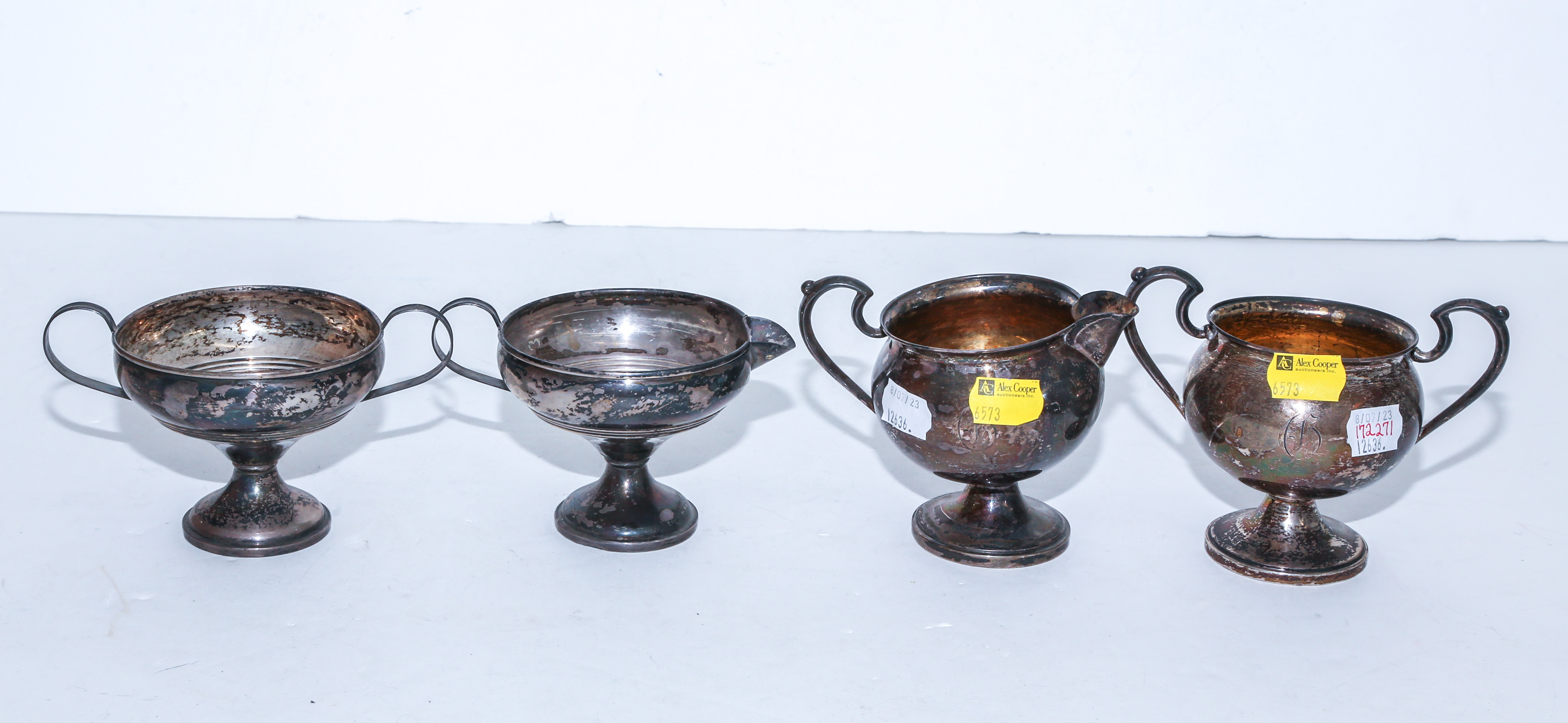 TWO PAIRS WEIGHTED STERLING CREAMERS
