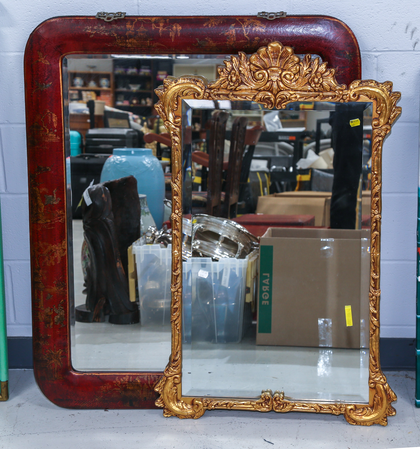 TWO FRAMED MIRRORS Including a 3c77ec