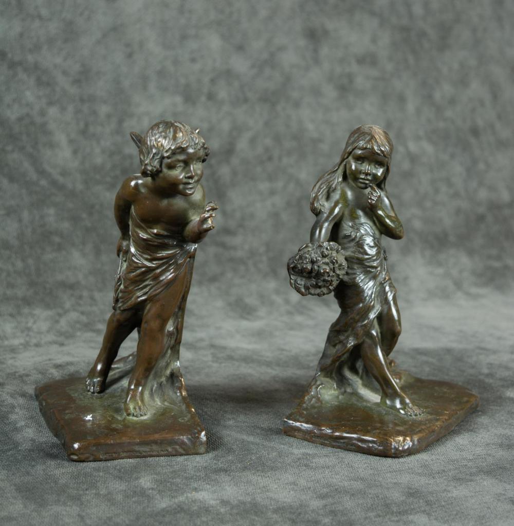 A PAIR OF FIGURAL SOLID BRONZE BOOKENDSA