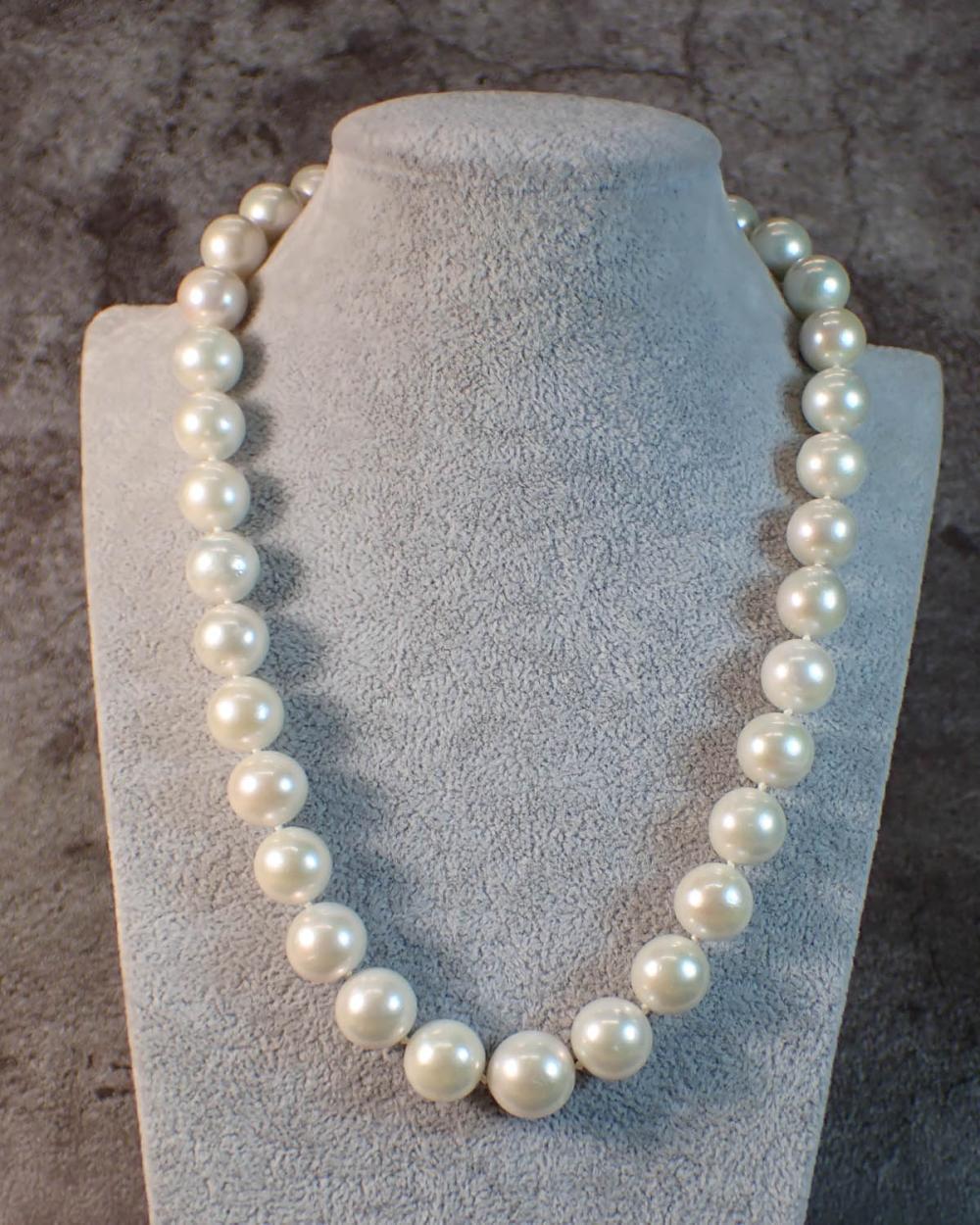 SOUTH SEA PEARL AND EIGHTEEN KARAT