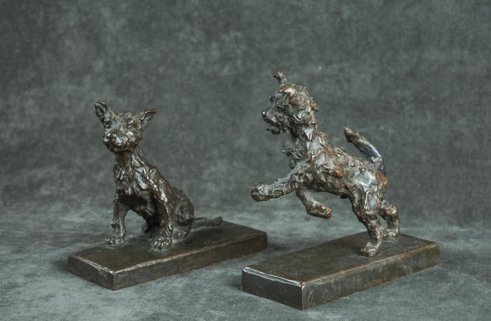 A PAIR OF SOLID CAST BRONZE TERRIER