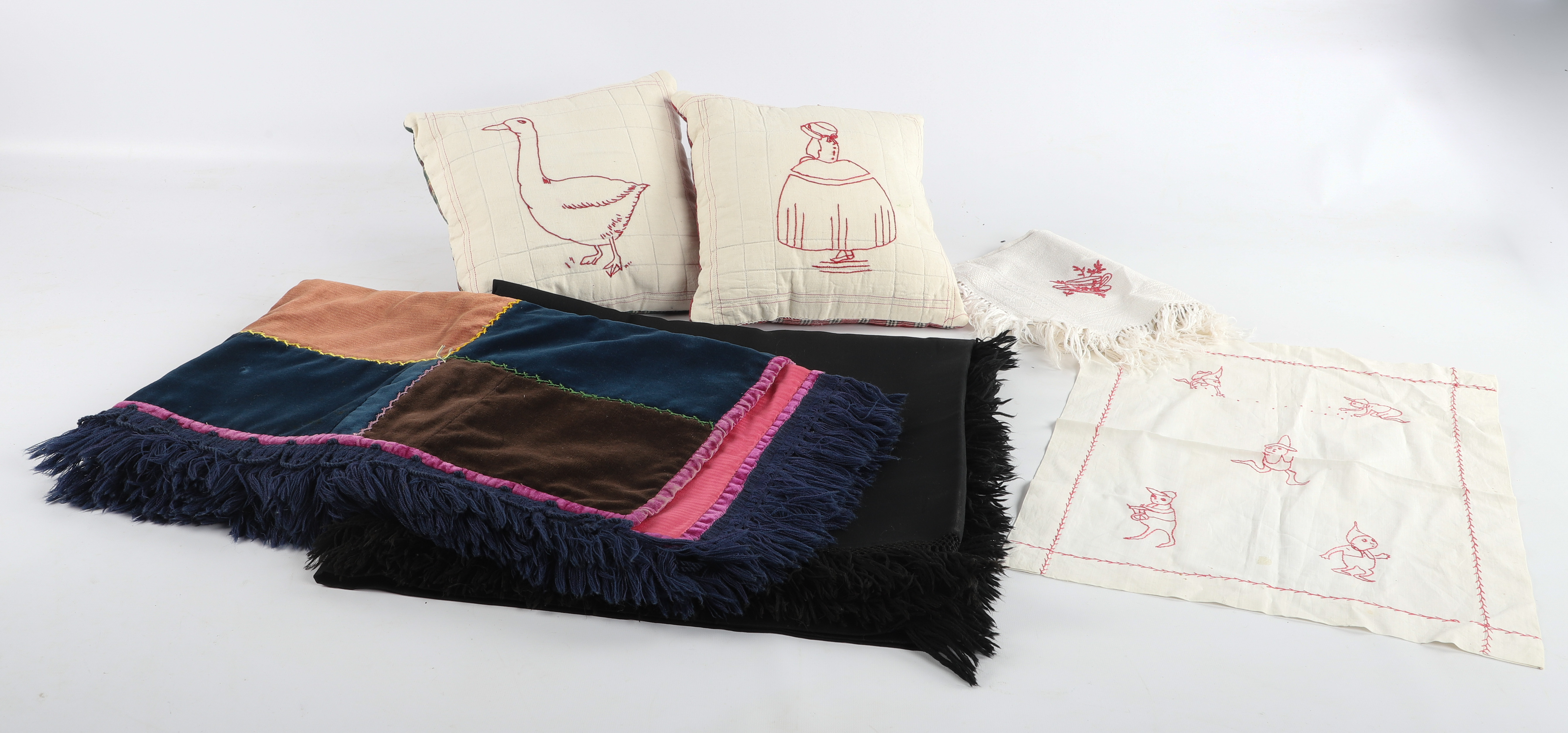 Lap blankets, embroidered pillows,