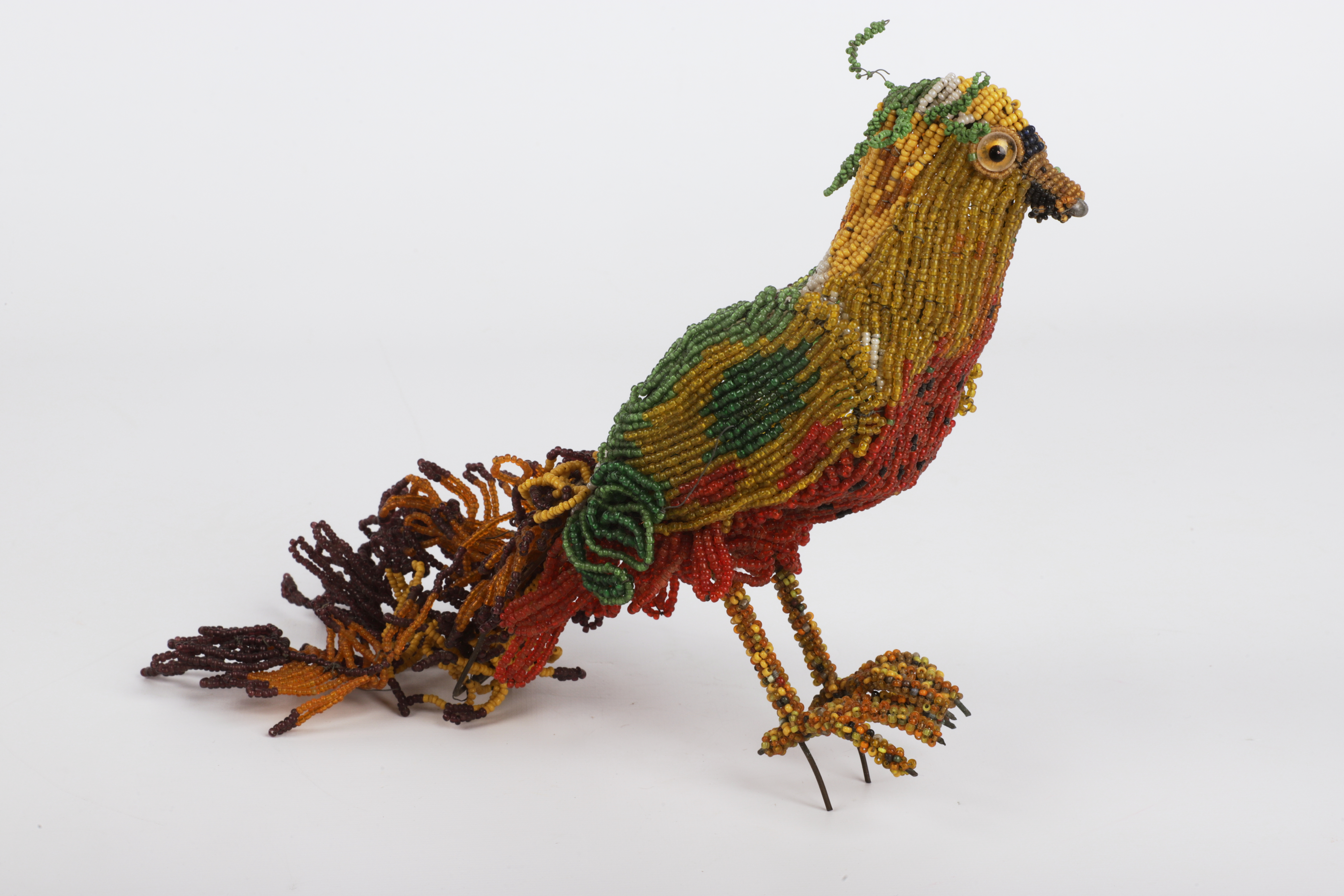 Beaded exotic bird figurine, approx