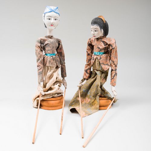 PAIR OF BALINESE PUPPETSWith stands.

18