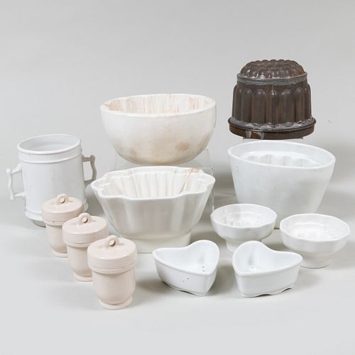 GROUP OF CERAMIC MOLDS AND VESSELSUnmarked.

Comprising:

Sixteen