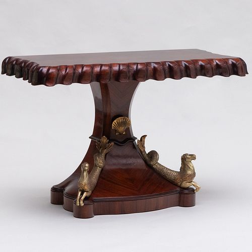 CONTINENTAL CARVED MAHOGANY AND PARCEL-GILT