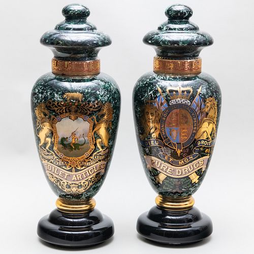 PAIR OF REVERSE PAINTED GLASS DRUGGIST