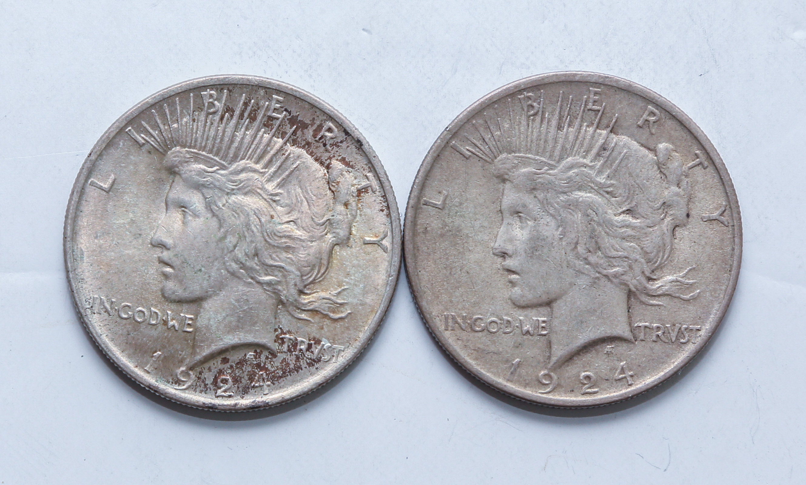 A PAIR OF 1924 PEACE DOLLARS Toned 3caf90