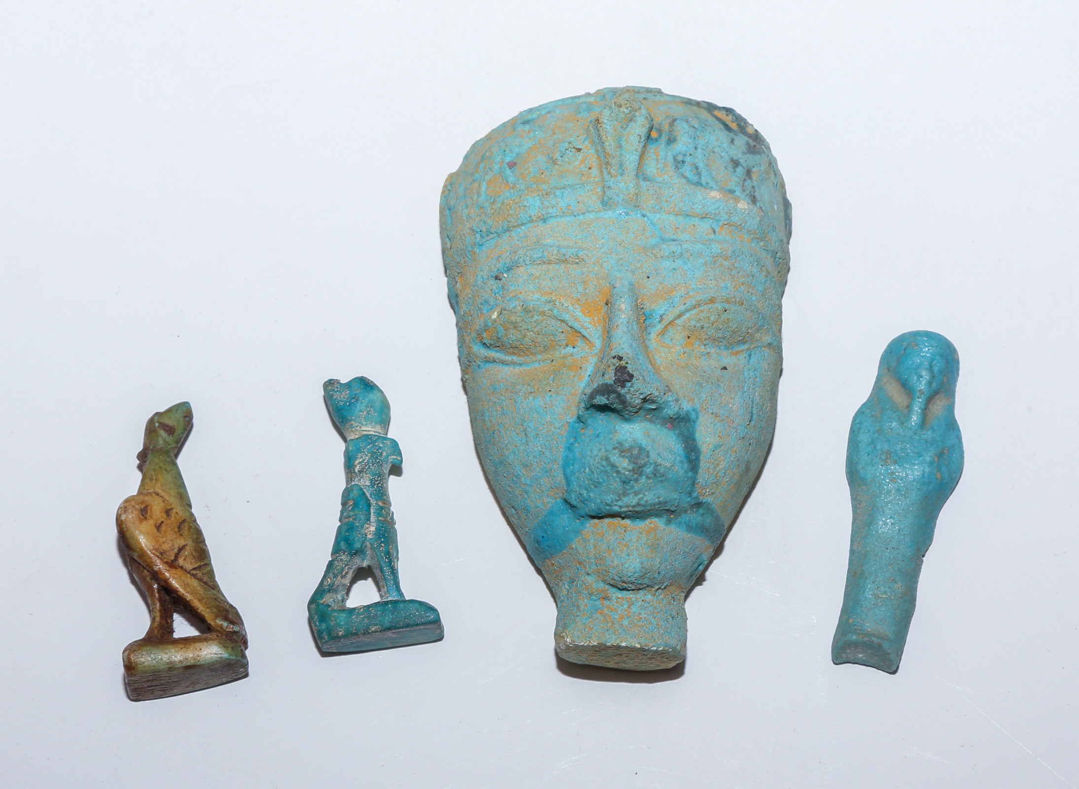 FOUR PIECES OF EGYPTIAN FAIENCE Including