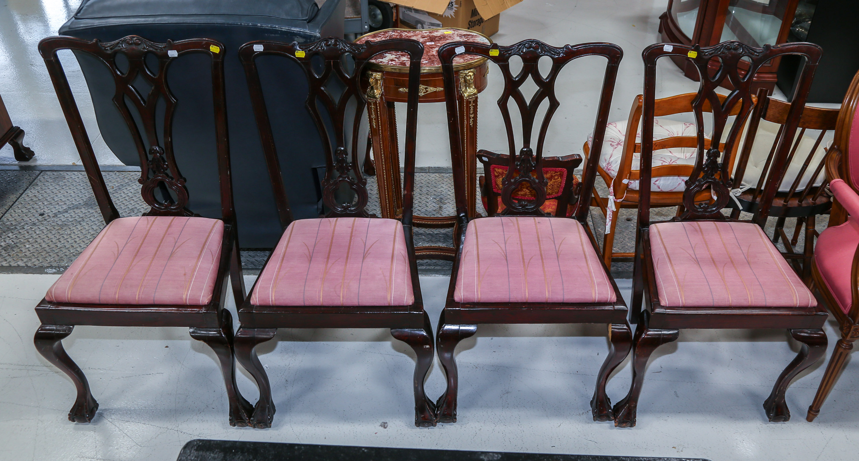 A SET OF FOUR CHIPPENDALE STYLE