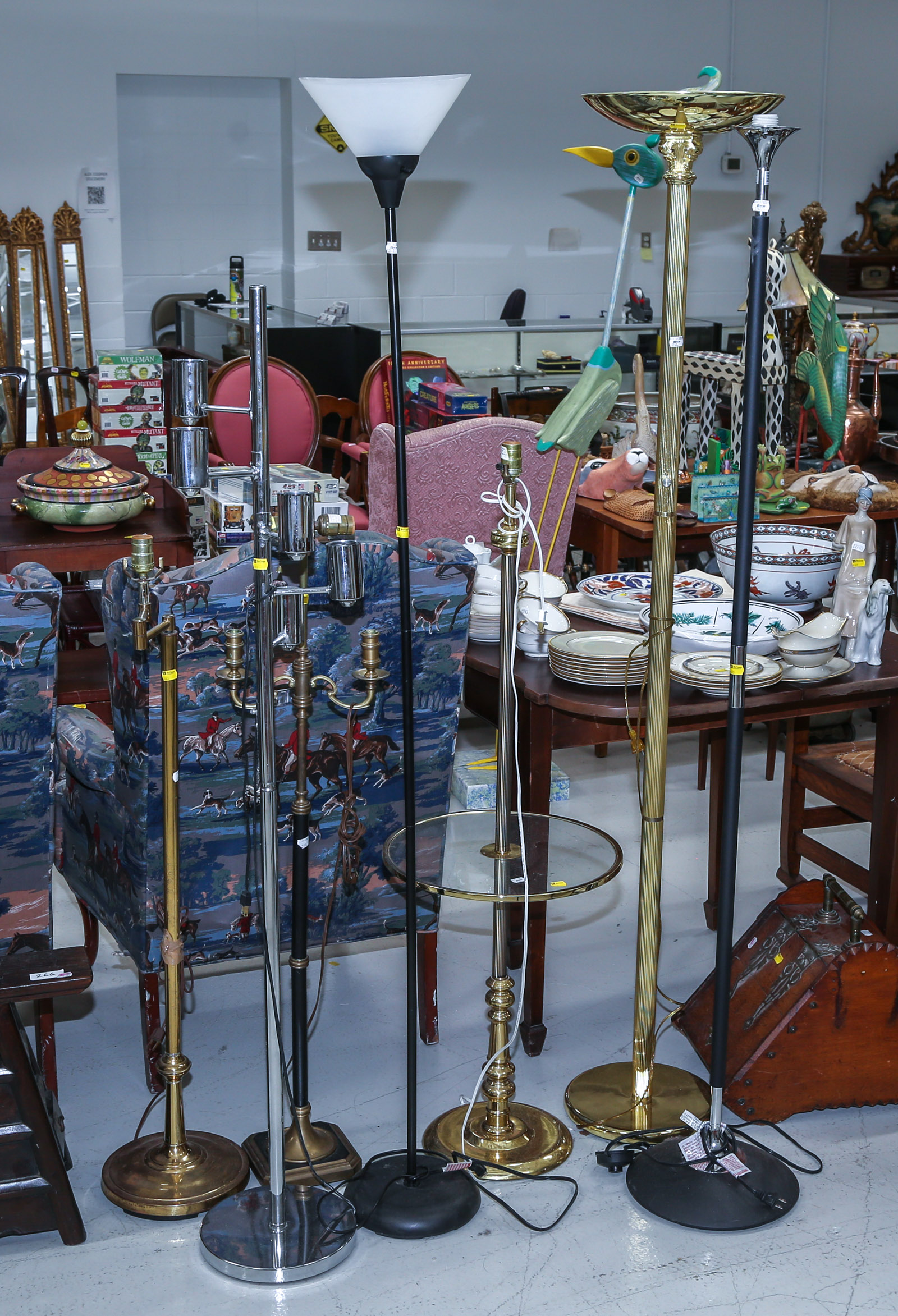 A GROUP OF SEVEN FLOOR LAMPS Including