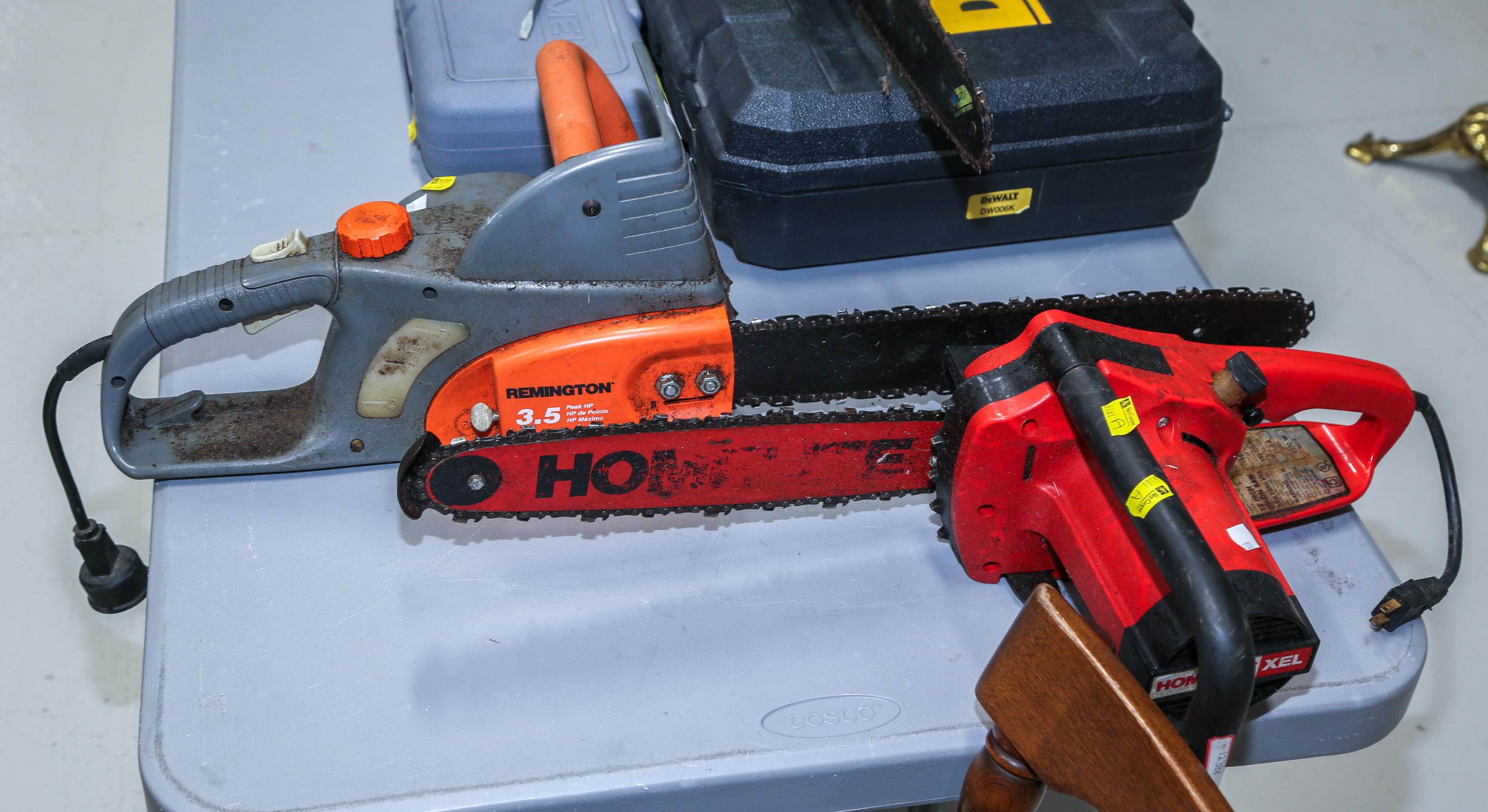TWO CHAIN SAWS Comprising a Homelite