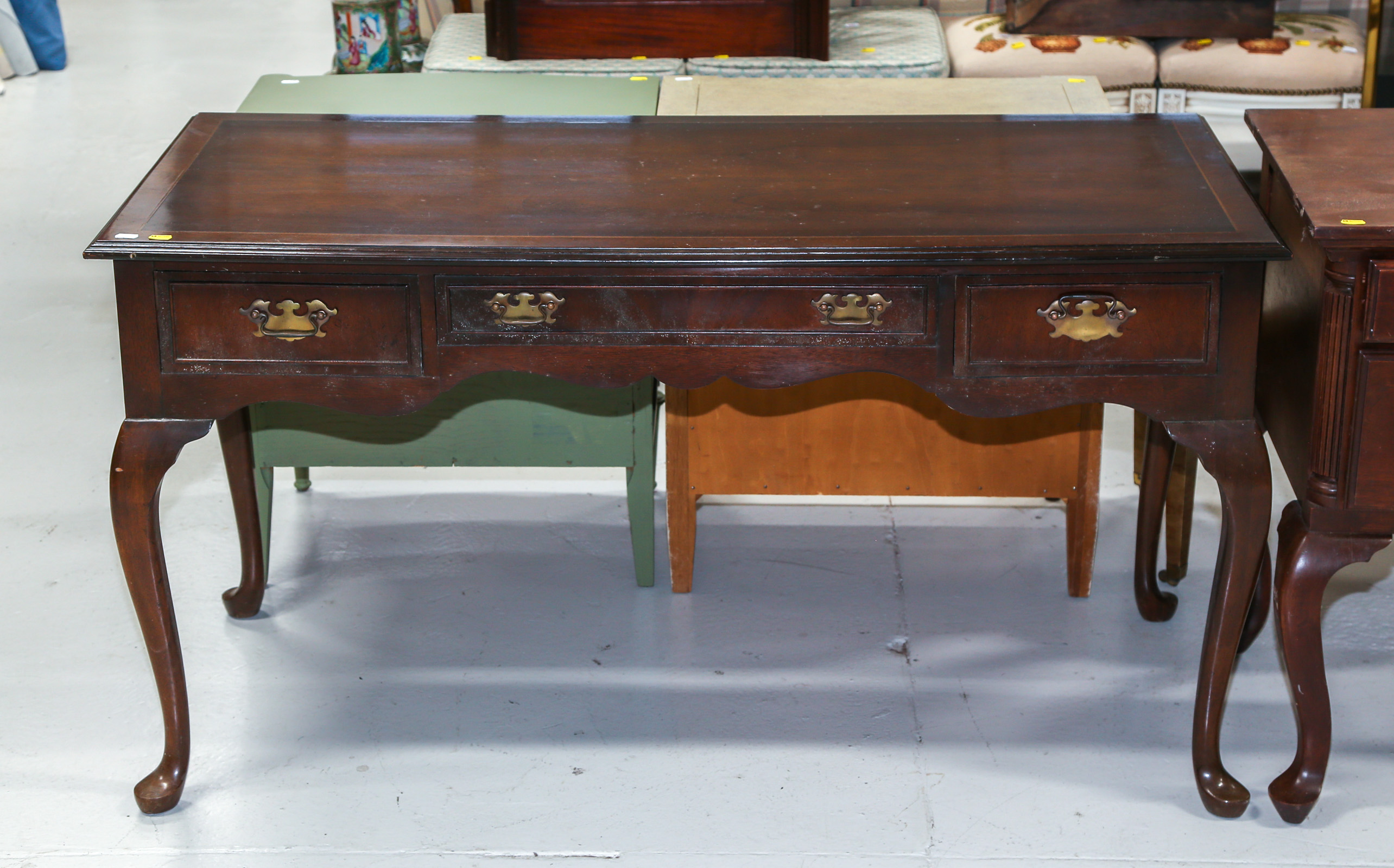 A QUEEN ANNE STYLE MAHOGANY DESK