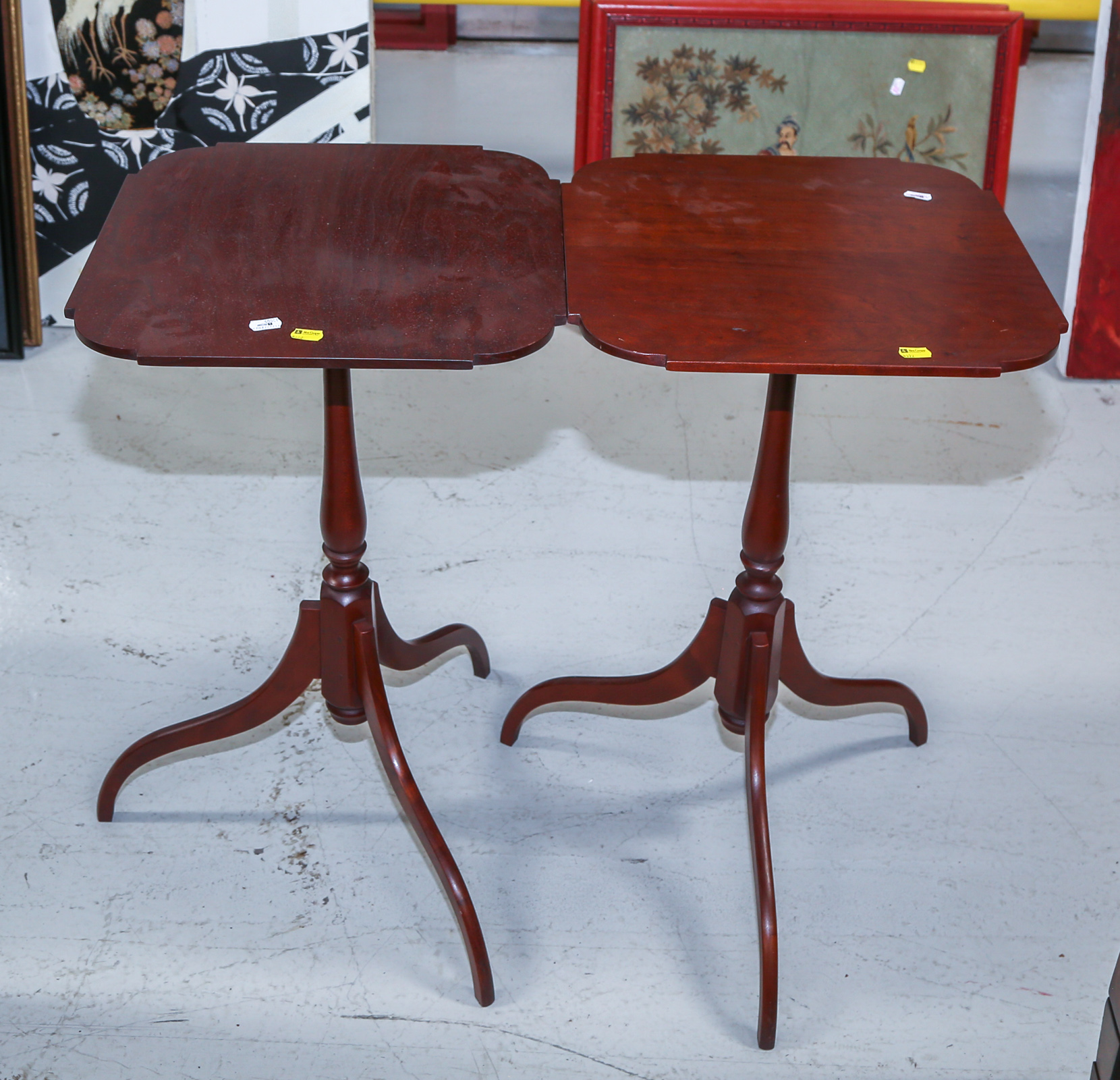 A PAIR OF ELDRED WHEELER CHERRY CANDLESTANDS