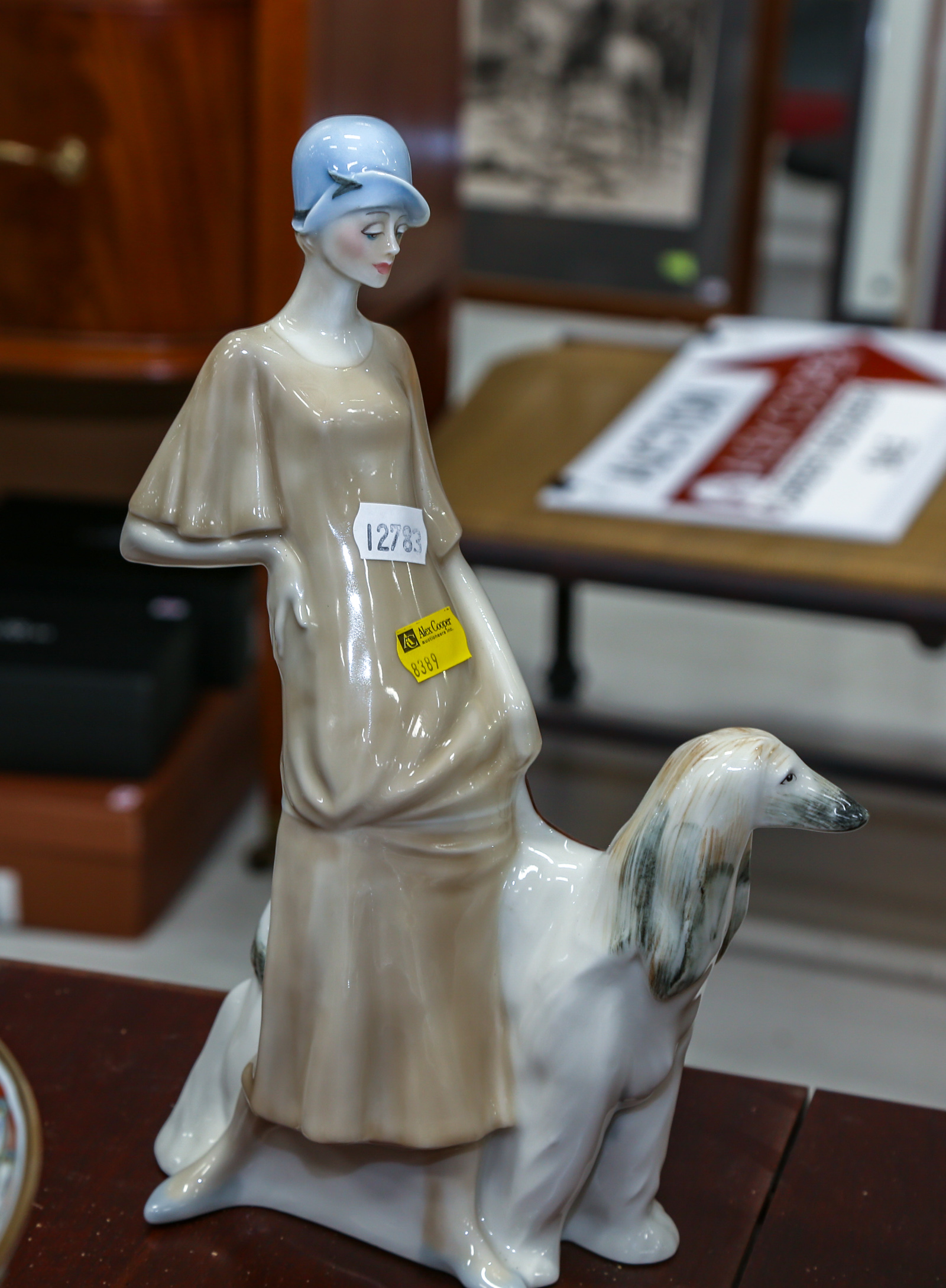 AN ADRIAN HUGHES CERAMIC WOMAN