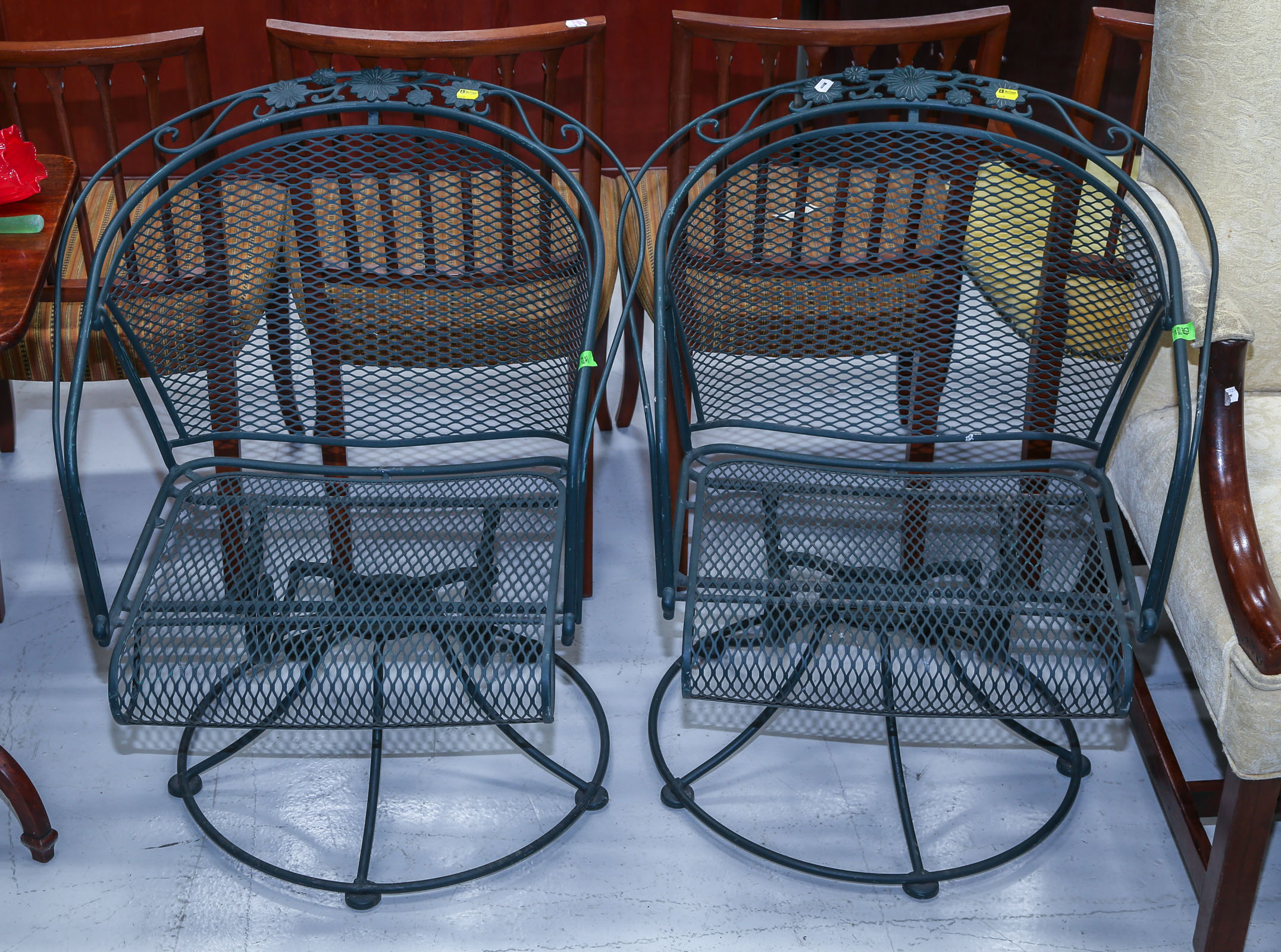 A PAIR OF PATINATED IRON PATIO 3cb762