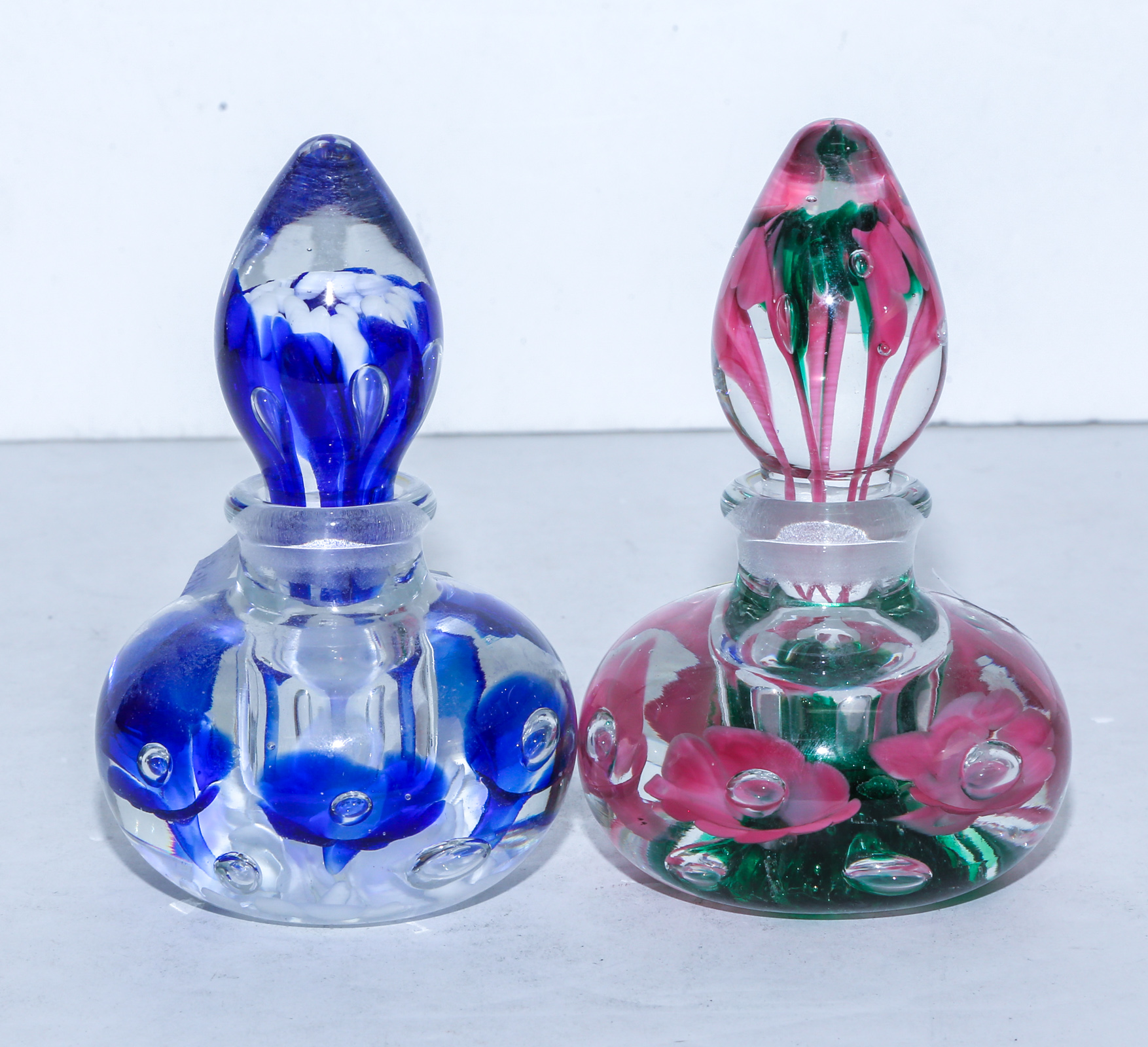 TWO PAPERWEIGHT DRESSER BOTTLES 3cb808