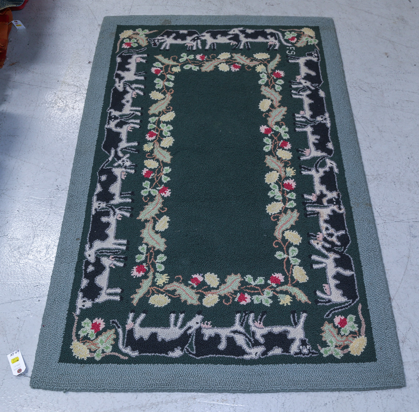 MCADOO HOOKED RUG WITH COW MOTIF,