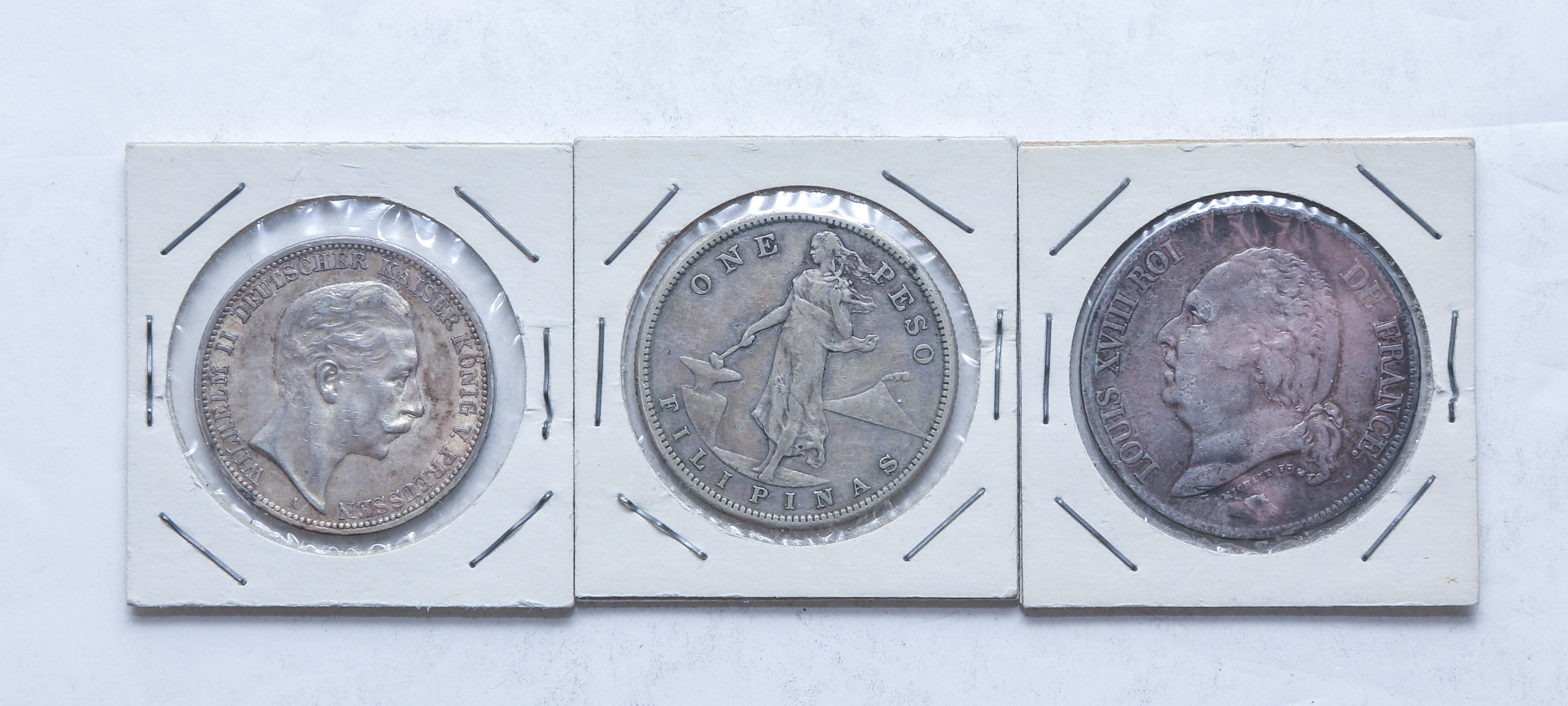 THREE WORLD DOLLAR SIZE SILVER