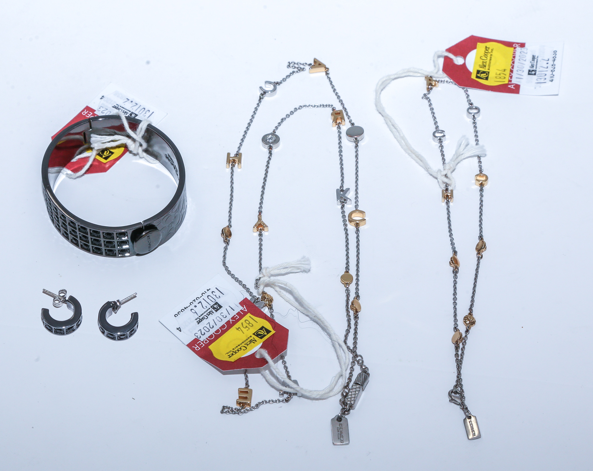 A GROUP OF COACH COSTUME JEWELRY