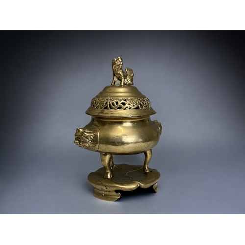A Chinese polished bronze Tripod