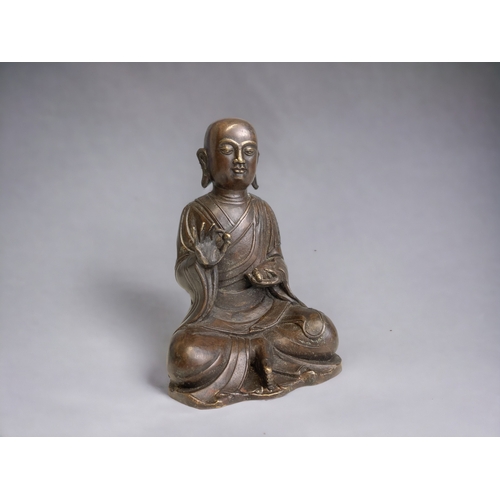 A Chinese Tibetan bronze seated 3c9448
