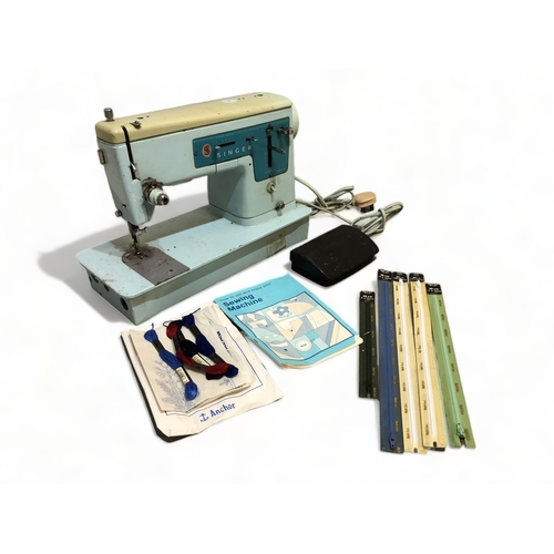 A VINTAGE SINGER ELECTRIC SEWING