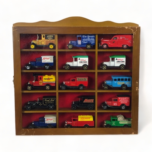 A cased collection of 15 model lorries.